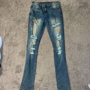 Gray skinny jeans, size 32 with embroidery designs